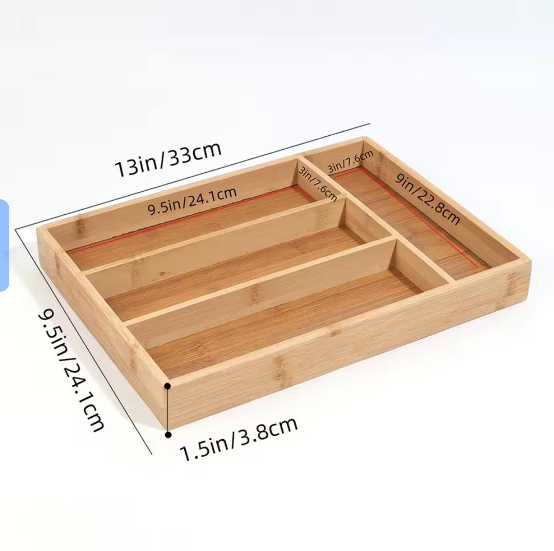 Bamboo kitchen drawer cutlery organizer with partitioned compartments for sorting silverware.
