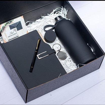 Executive 4 in 1 gift set
Thermal insulated Flask-500 mls
Notebook 
Executive signature pen 
Key holder