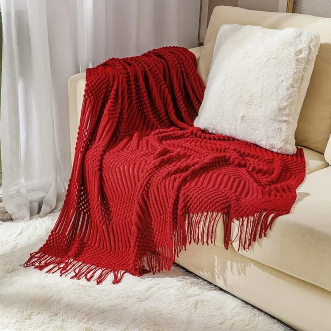 knited throw blanket 
with tassels