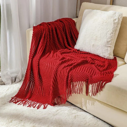 knited throw blanket 
with tassels