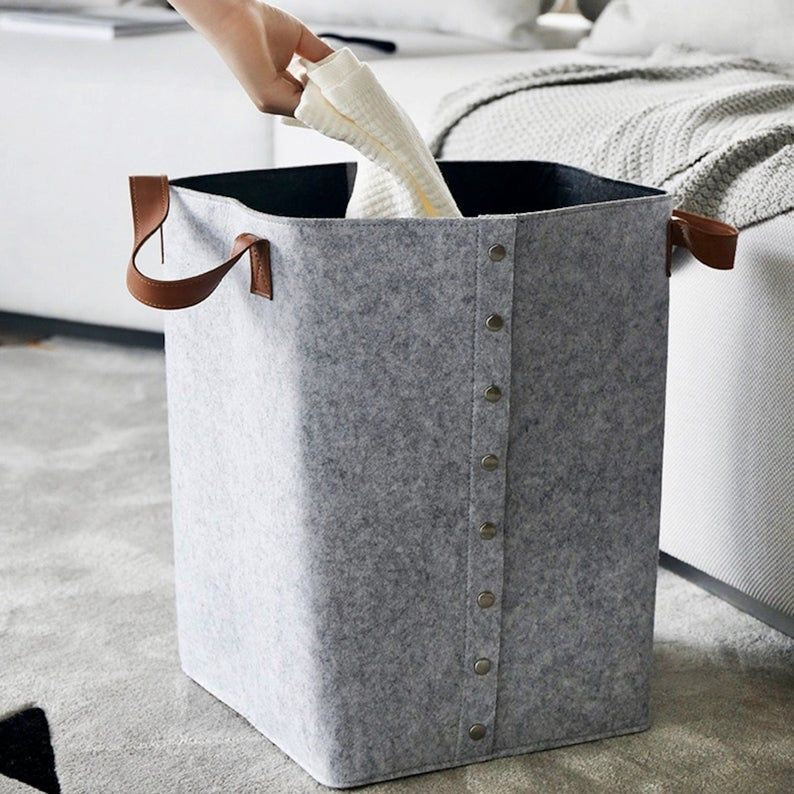 Foldable laundry basket with leather handles