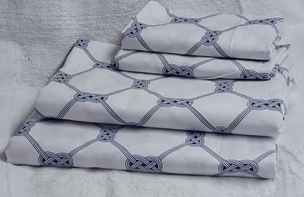 A pair of both printed pure cotton bedsheets