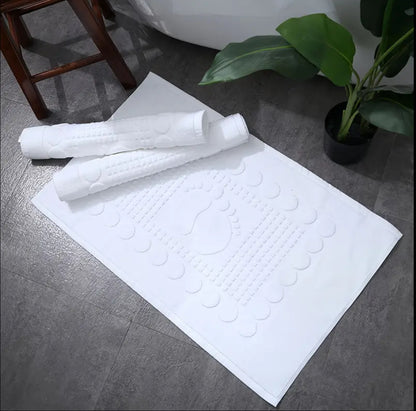 White cotton bath mats