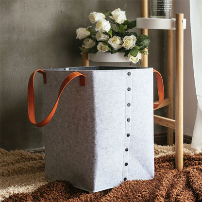 Foldable laundry basket with leather handles