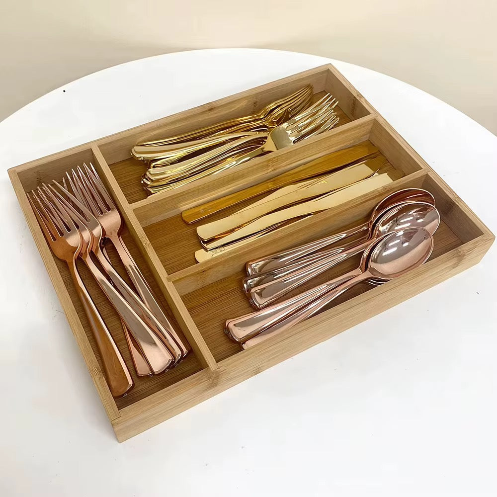 Bamboo kitchen drawer cutlery organizer with partitioned compartments for sorting silverware.
