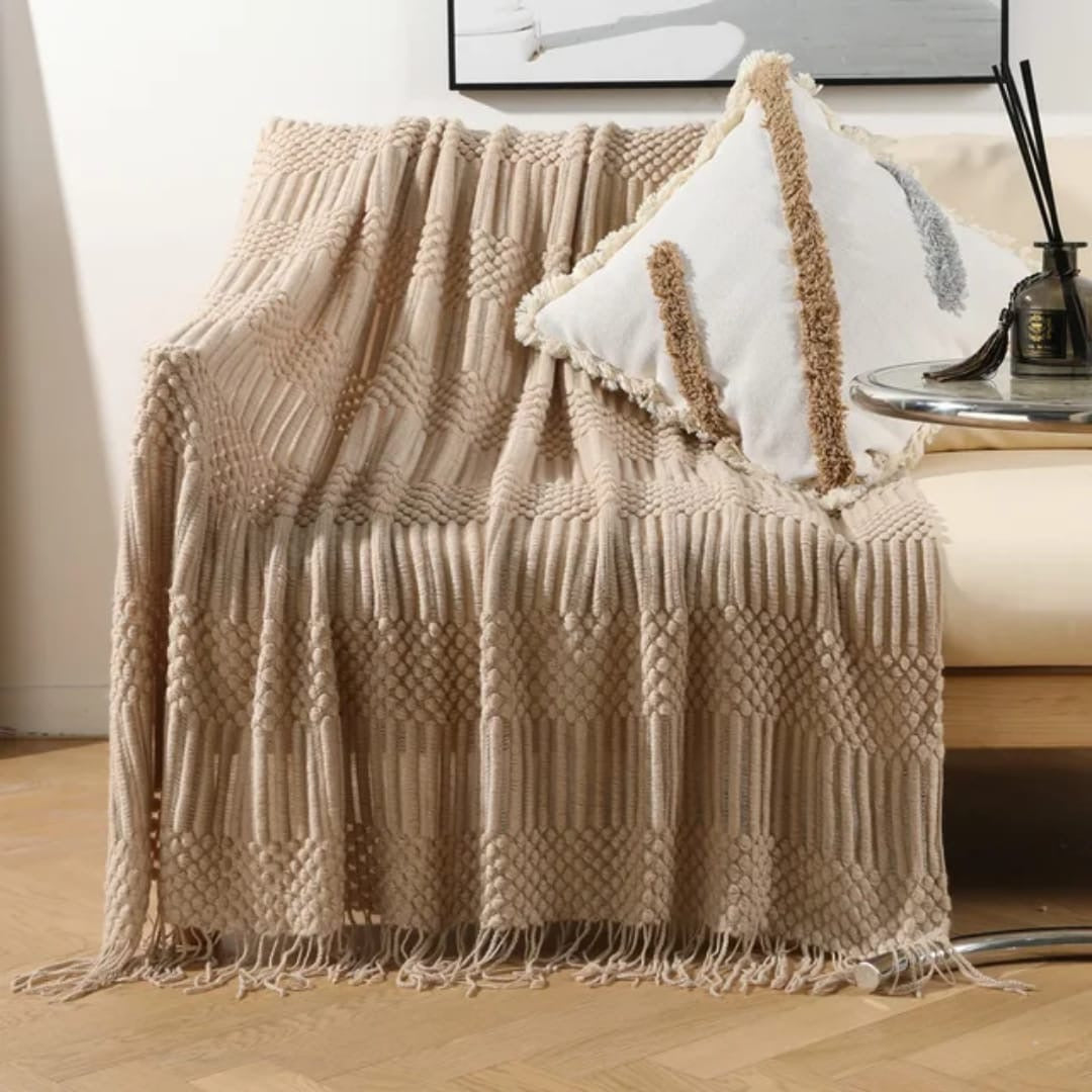 knited throw blanket 
with tassels
