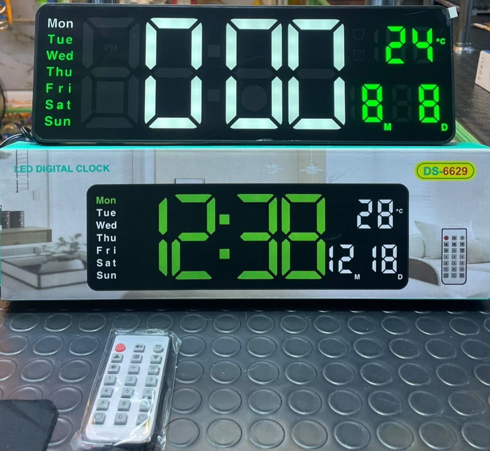 large digital LED wall clock with a remote control and display box
