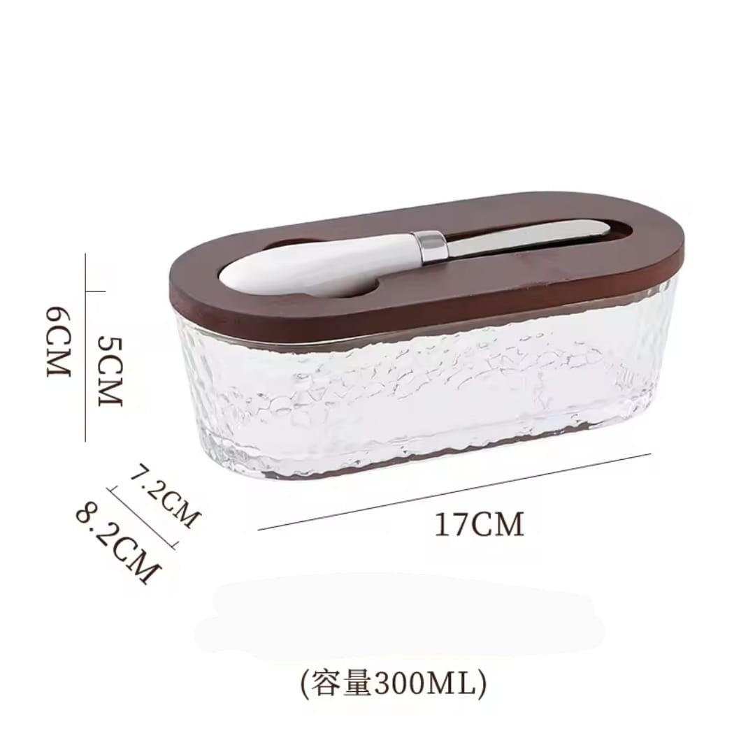 Glass butter dish with bamboo lid and spread knife