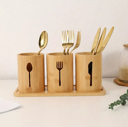 Eco-friendly 4in 1 bamboo cutlery holder inclusive of a bamboo base