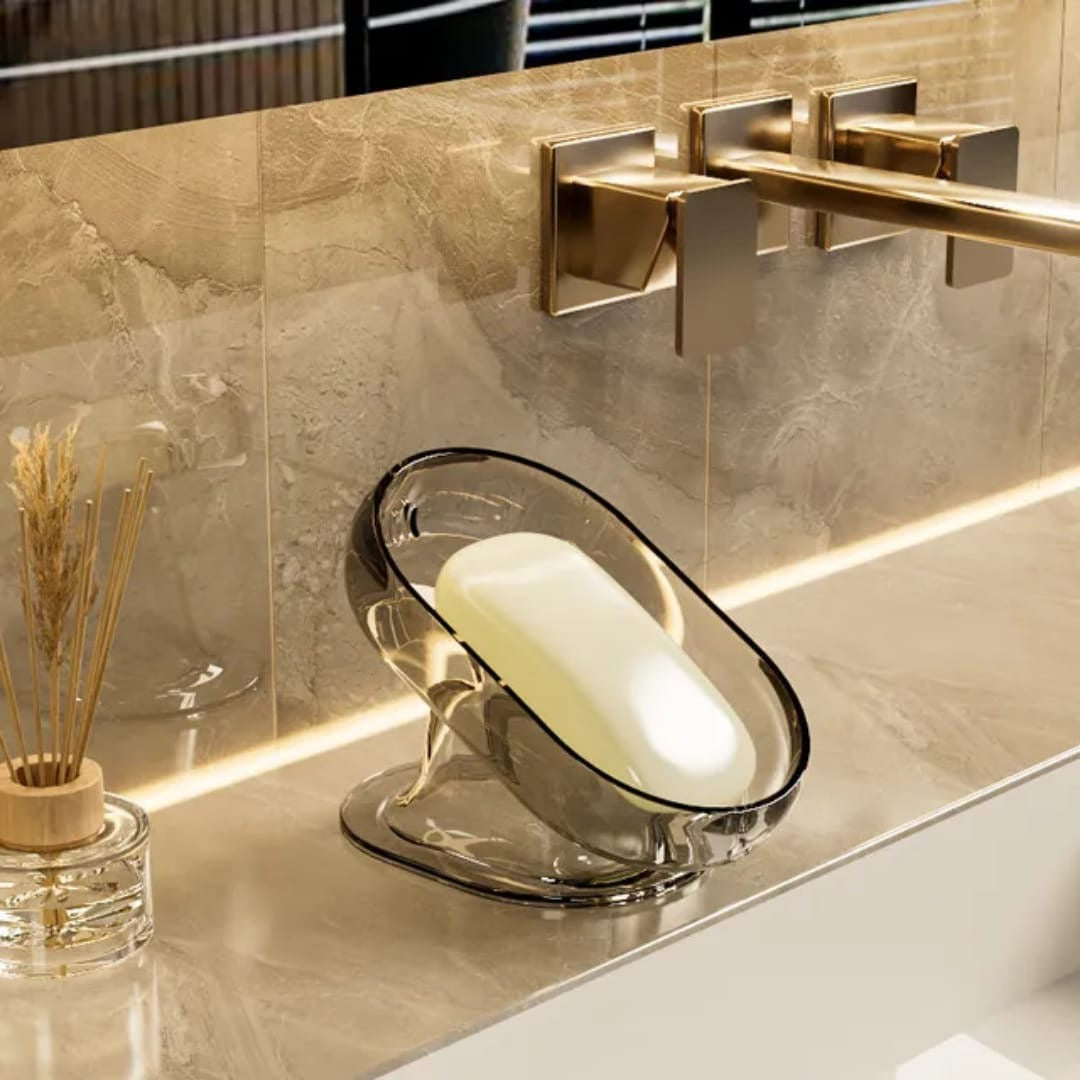 Sloped drain transparent soap dish.