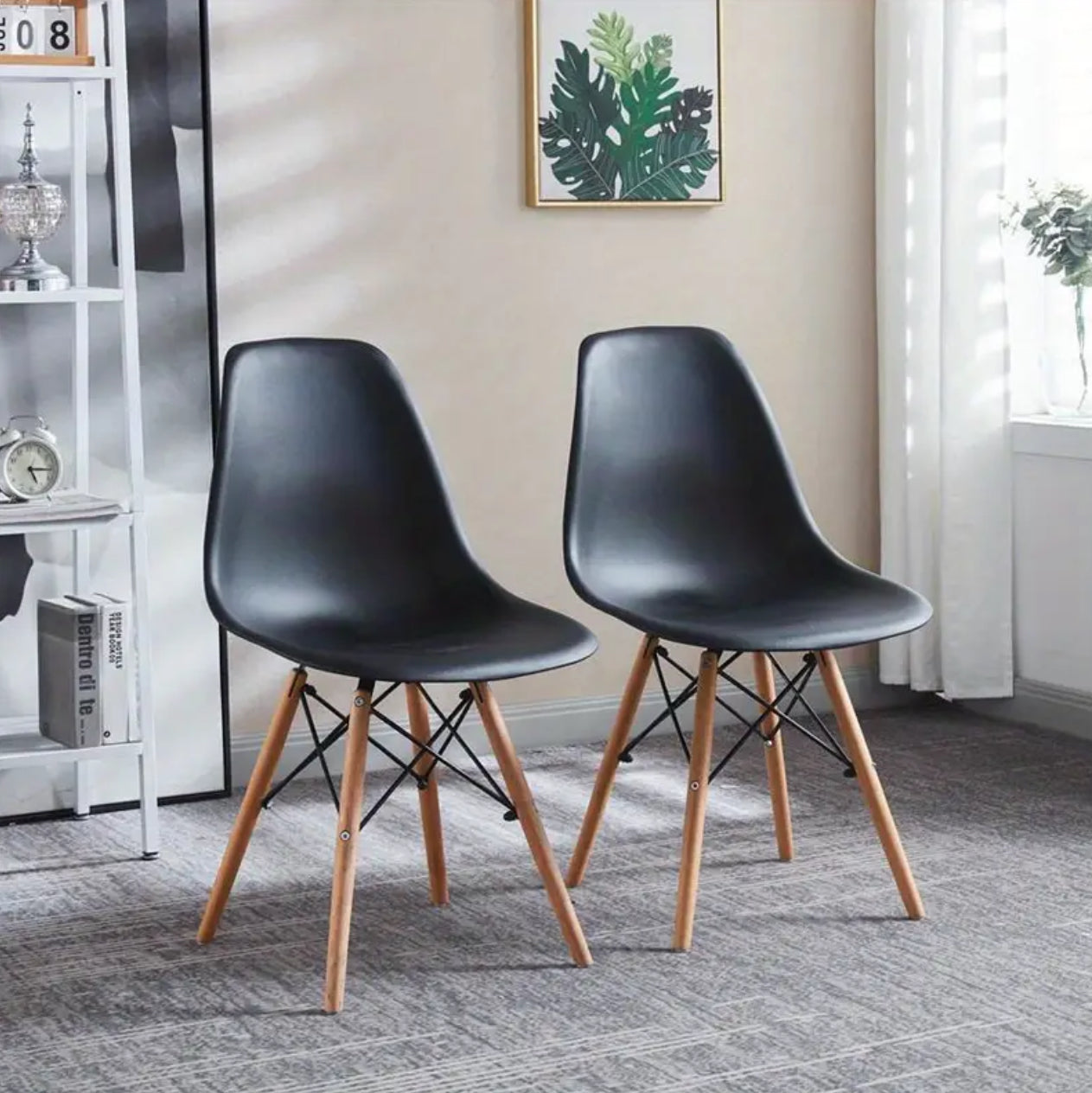 Modern black dining chair a with wooden legs