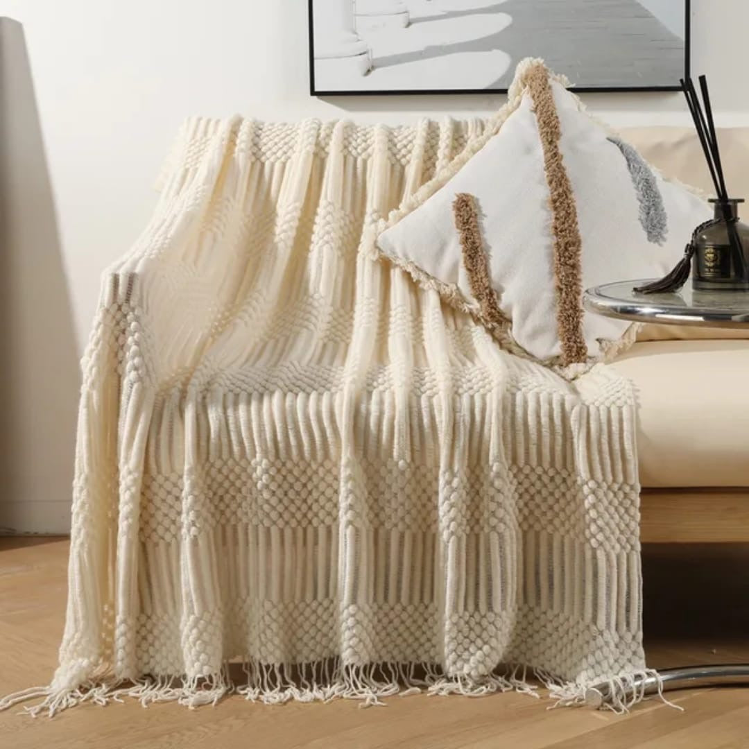 knited throw blanket 
with tassels
