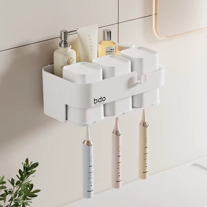 Bathroom wall mounted toothbrush holder with 3 cups.