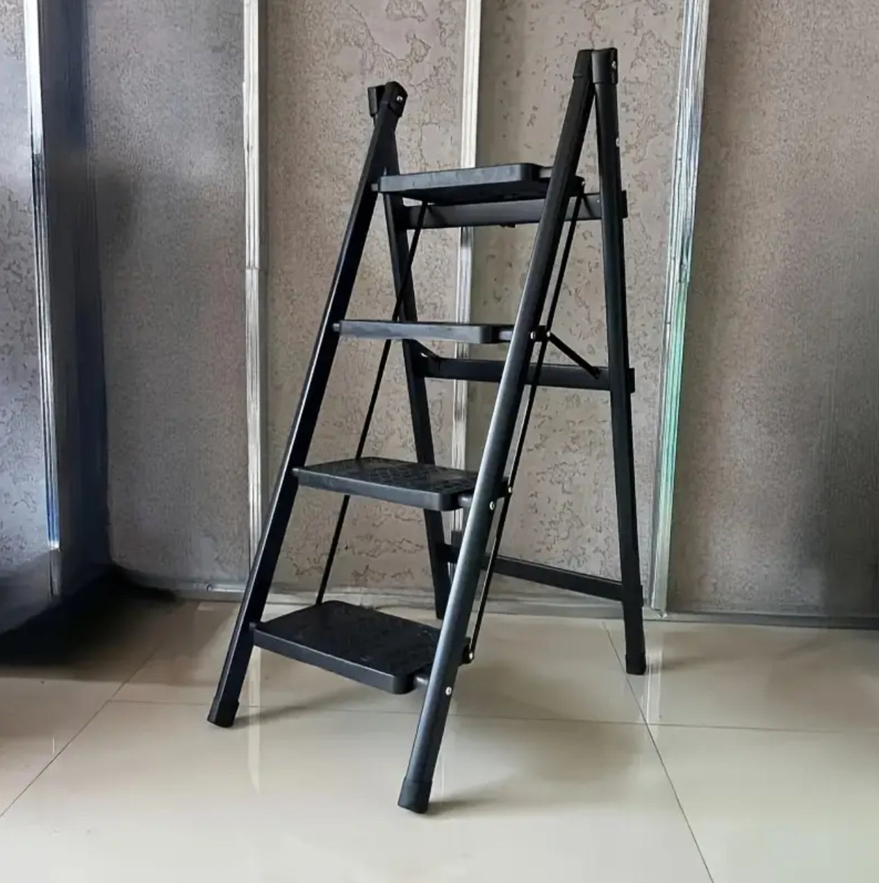 4 step Black foldable stepper ladder