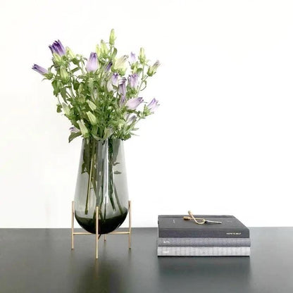 Modern creative dark  glass vase with a gold stand