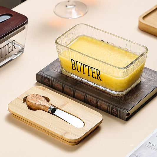 Glass butter dish with bamboo lid and spread knife