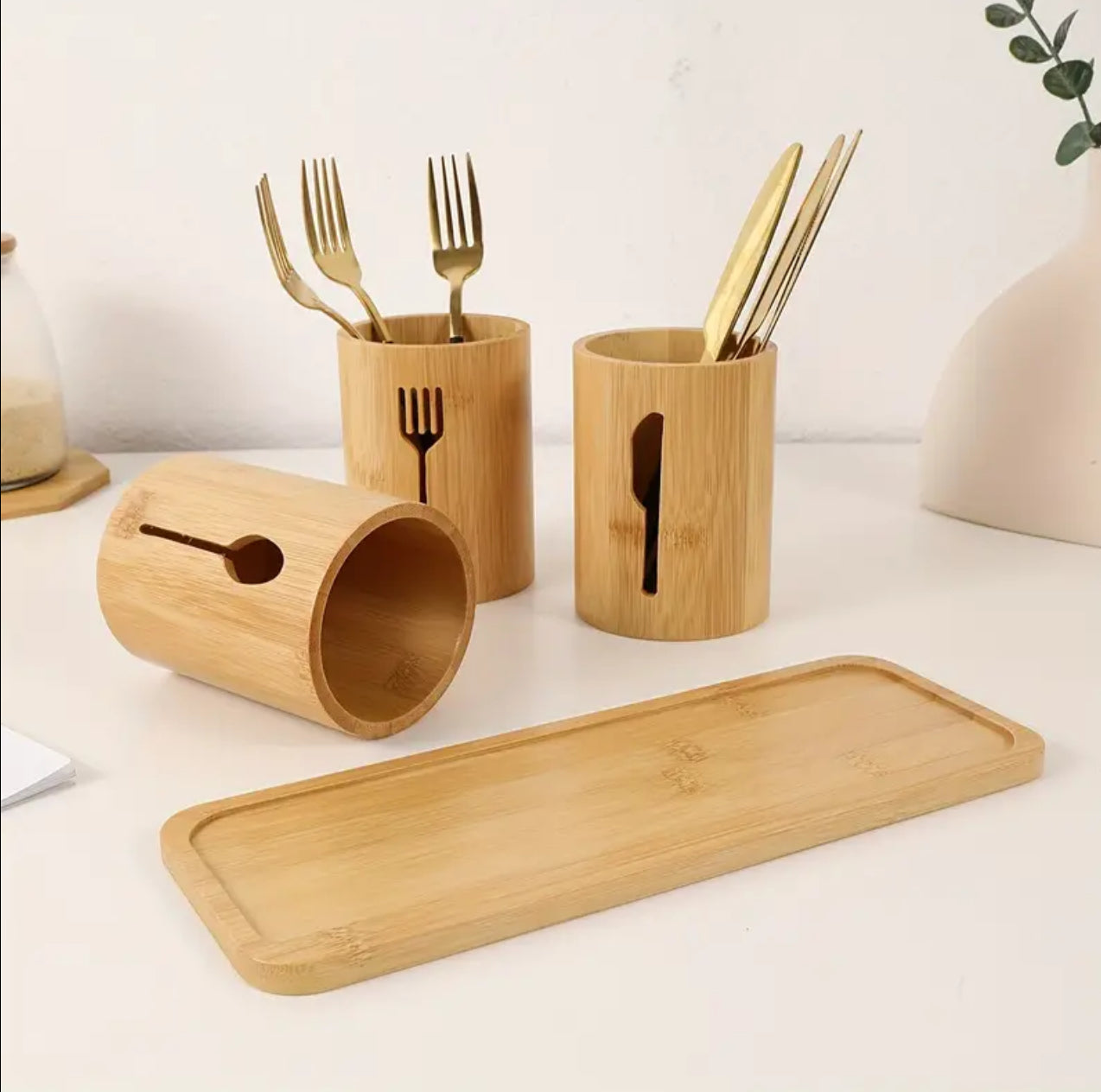 Eco-friendly 4in 1 bamboo cutlery holder inclusive of a bamboo base