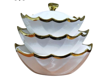 Ceramic serving bowl with gold rim