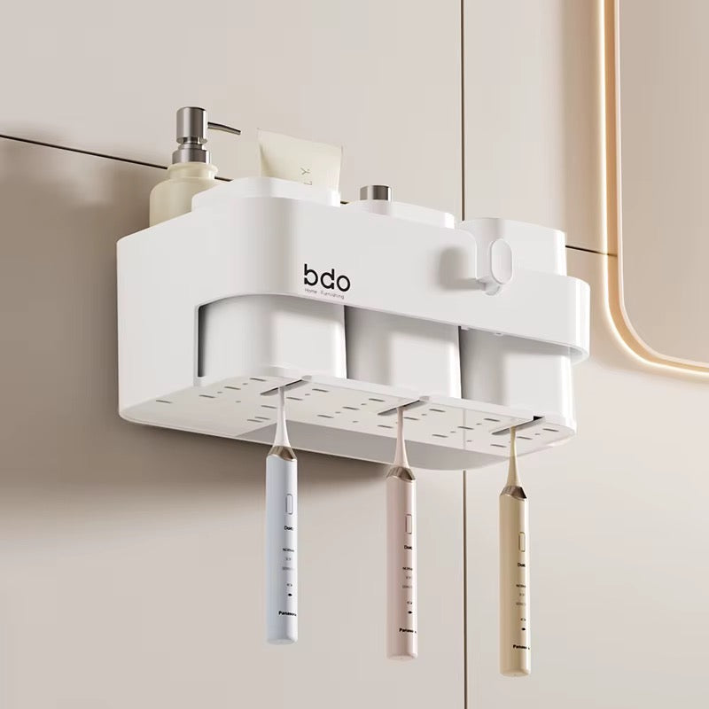 Bathroom wall mounted toothbrush holder with 3 cups.