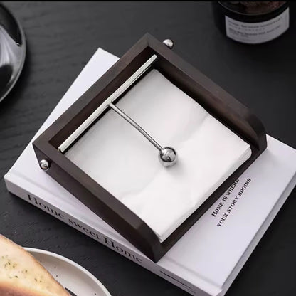 Walnut wood serviette holder with metal weighted bar