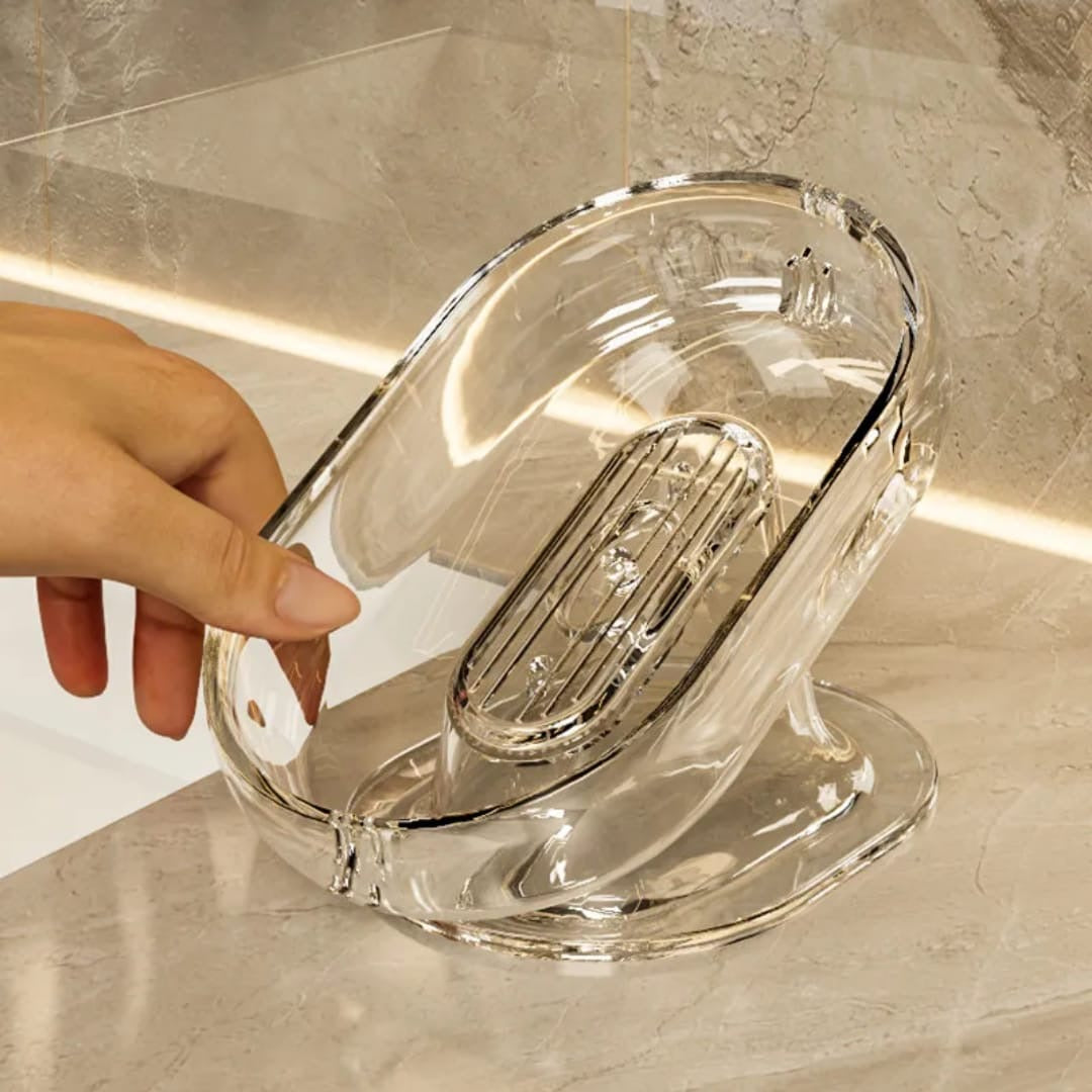 Sloped drain transparent soap dish.