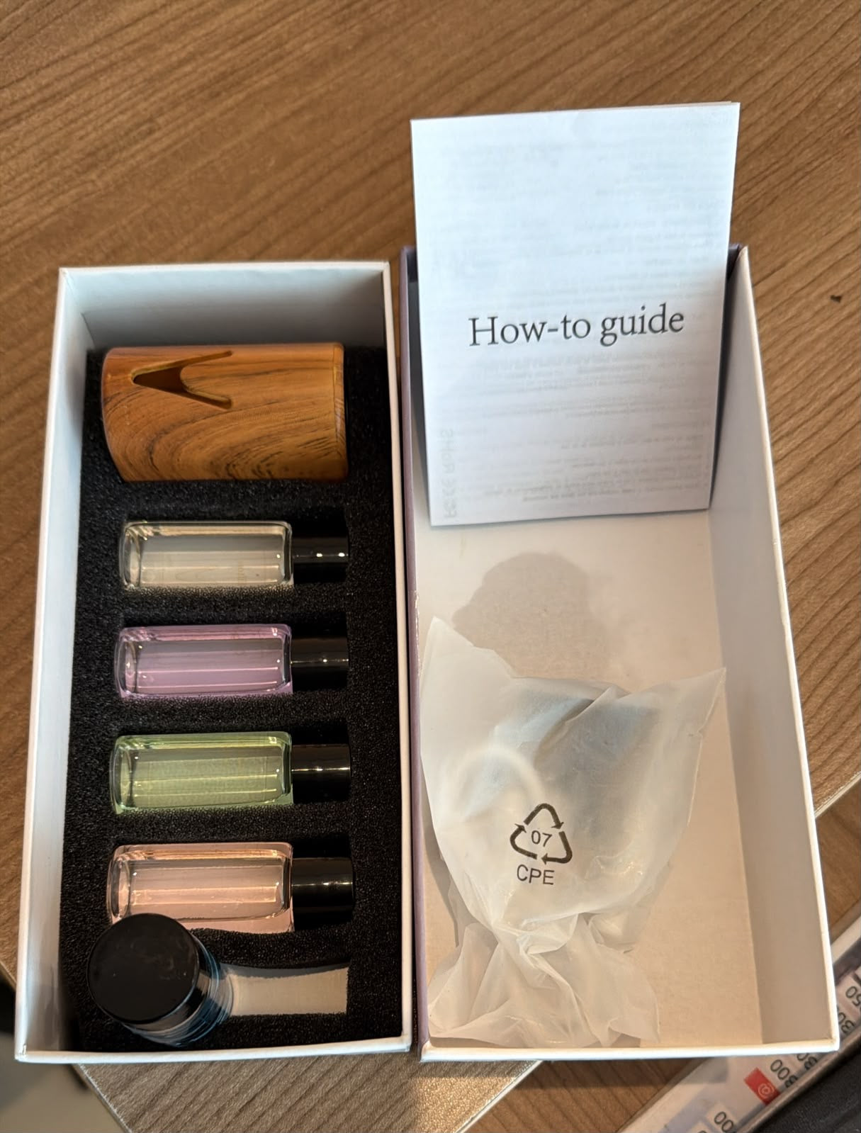 Smart Magnetic Car Diffuser with Ambient Lighting and 5 Bottles of replacement oils