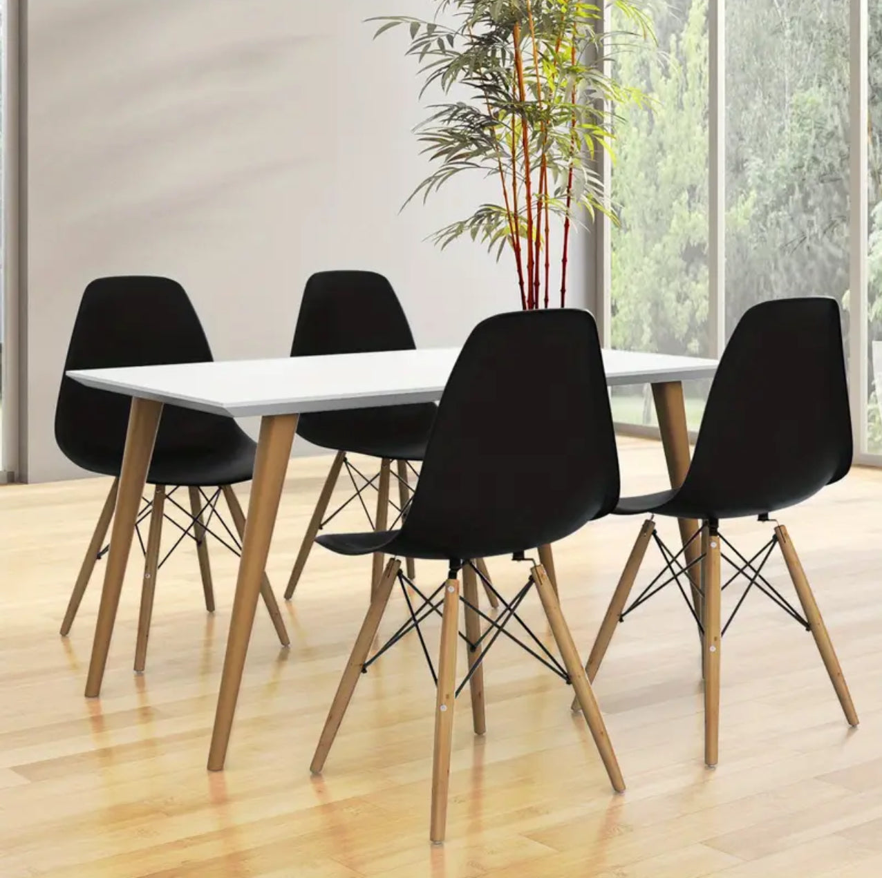 Modern black dining chair a with wooden legs