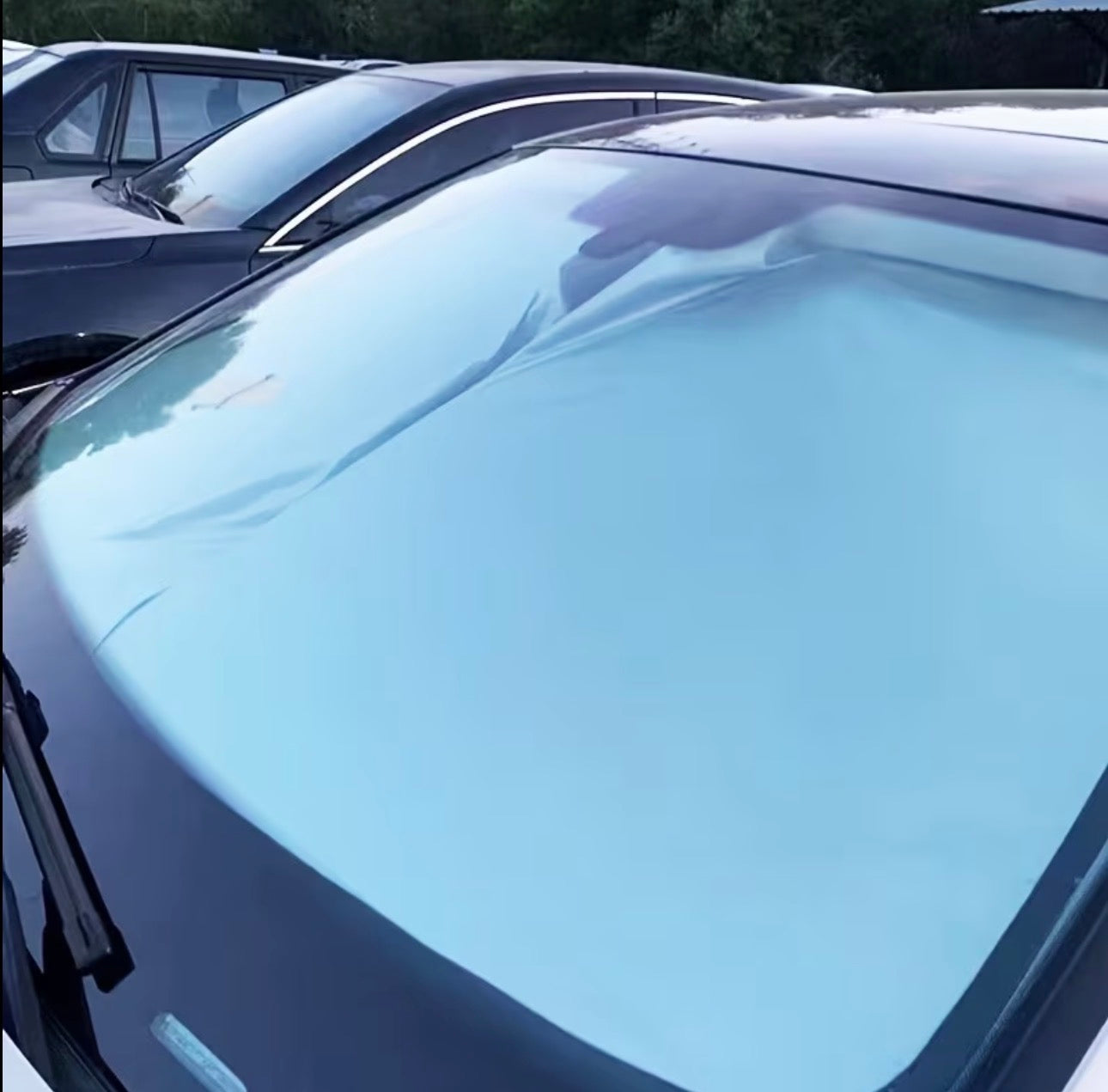 FOLDABLE CAR WINDSHIELD SUN SHADE WITH STORAGE POUCH