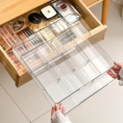 Acrylic expandable drawer organizer.