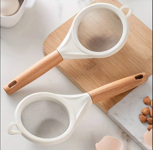 Wooden handle stainless mesh sieve.