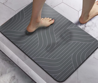 Absorbent floor mat