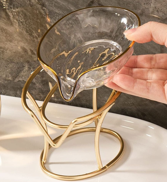 Slanted self draining soap dish