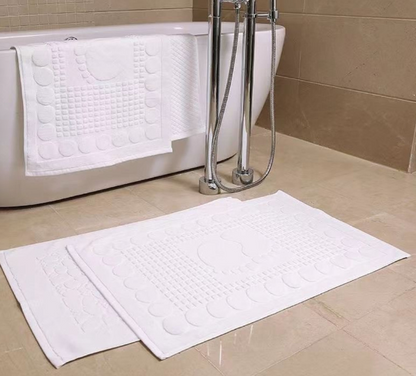 White cotton bath mats