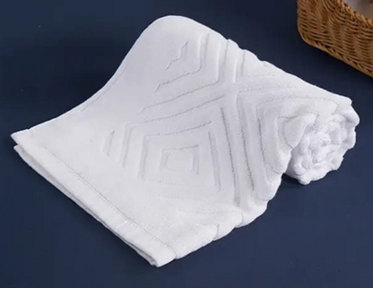 White cotton bath mats