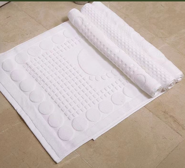 White cotton bath mats