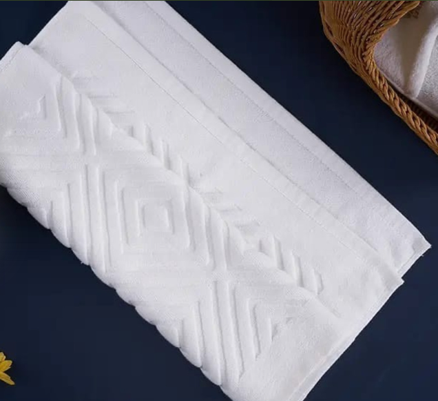 White cotton bath mats