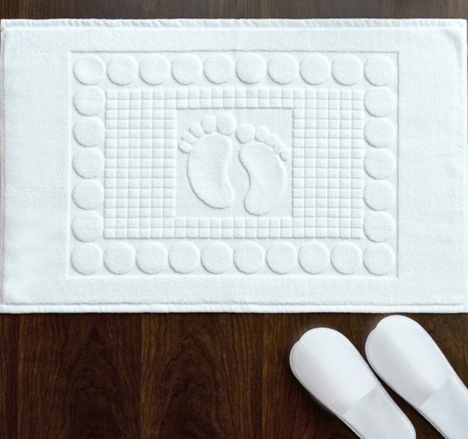 White cotton bath mats