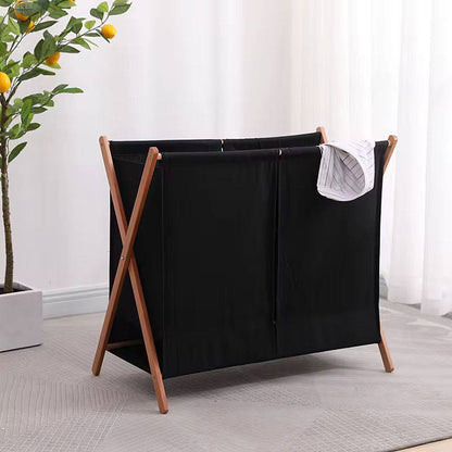 Foldable partitioned laundry basket
