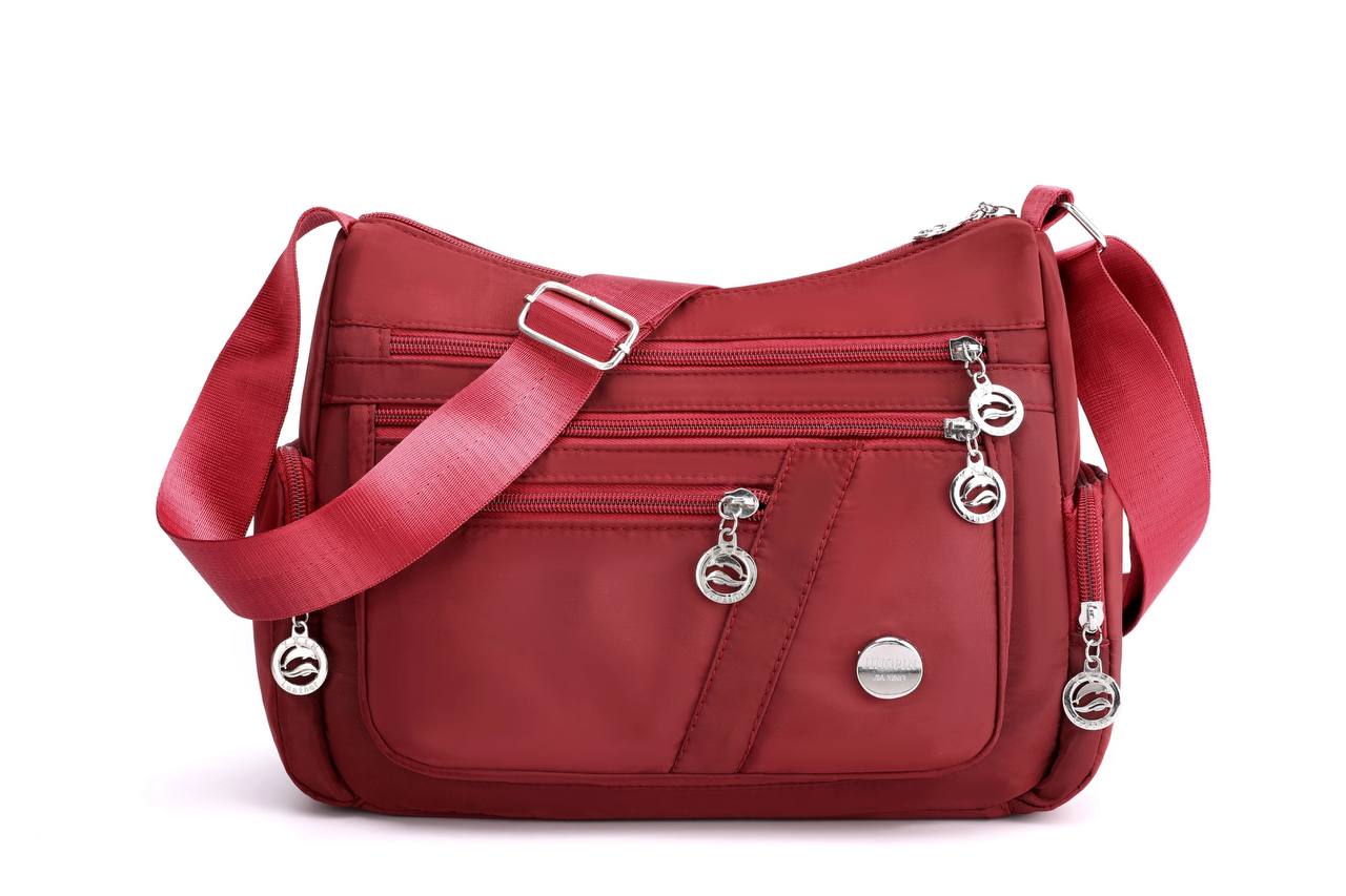 Multi-comnartment cross body bag