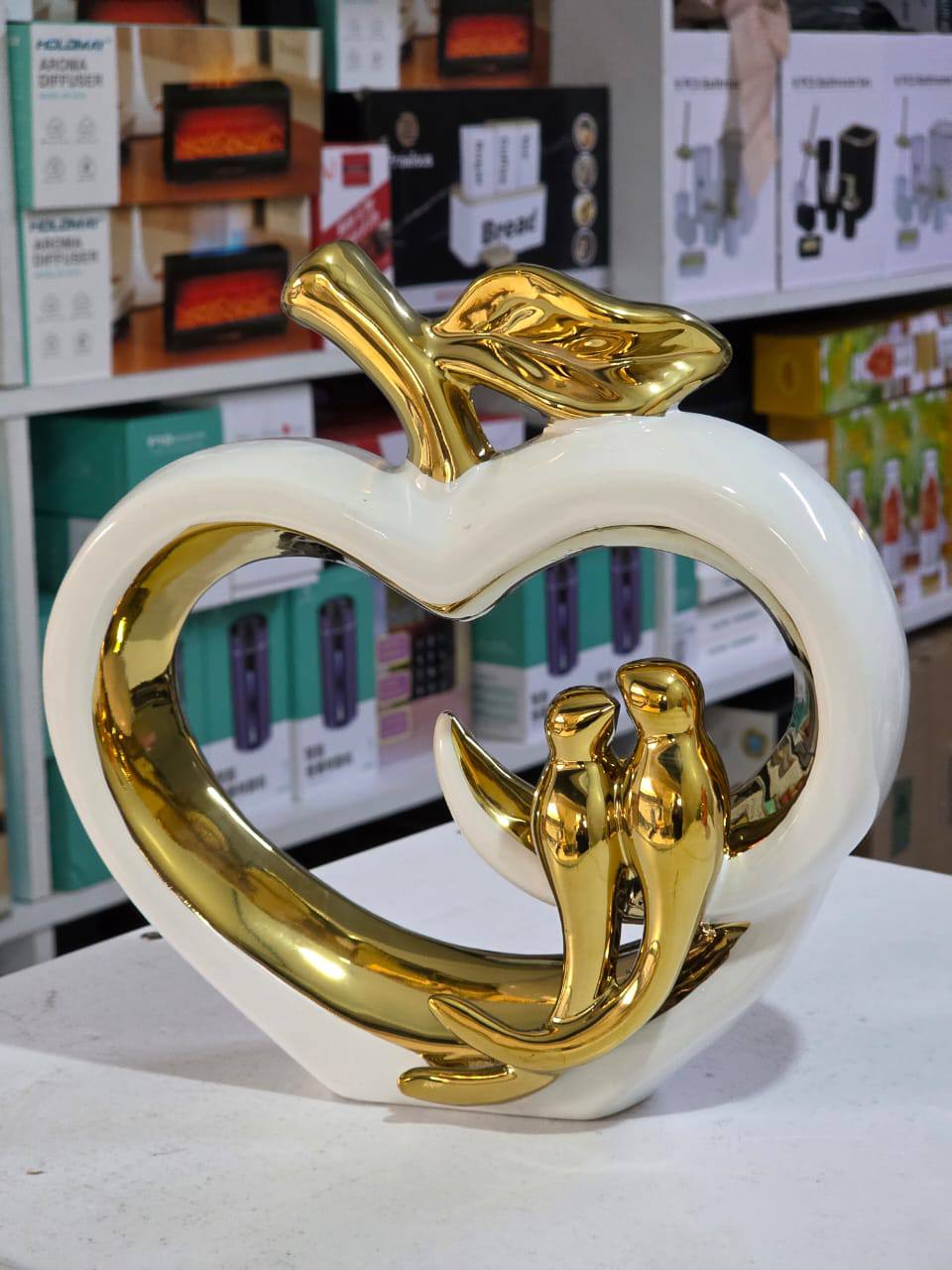 Ceramic hollow crafts Apple golden bird simulation