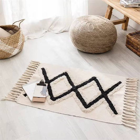 Bohemian Nordic style bedroom rug with tassels
