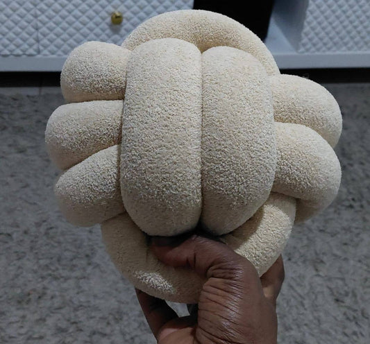 Fluffy Knot Throw Pillows
