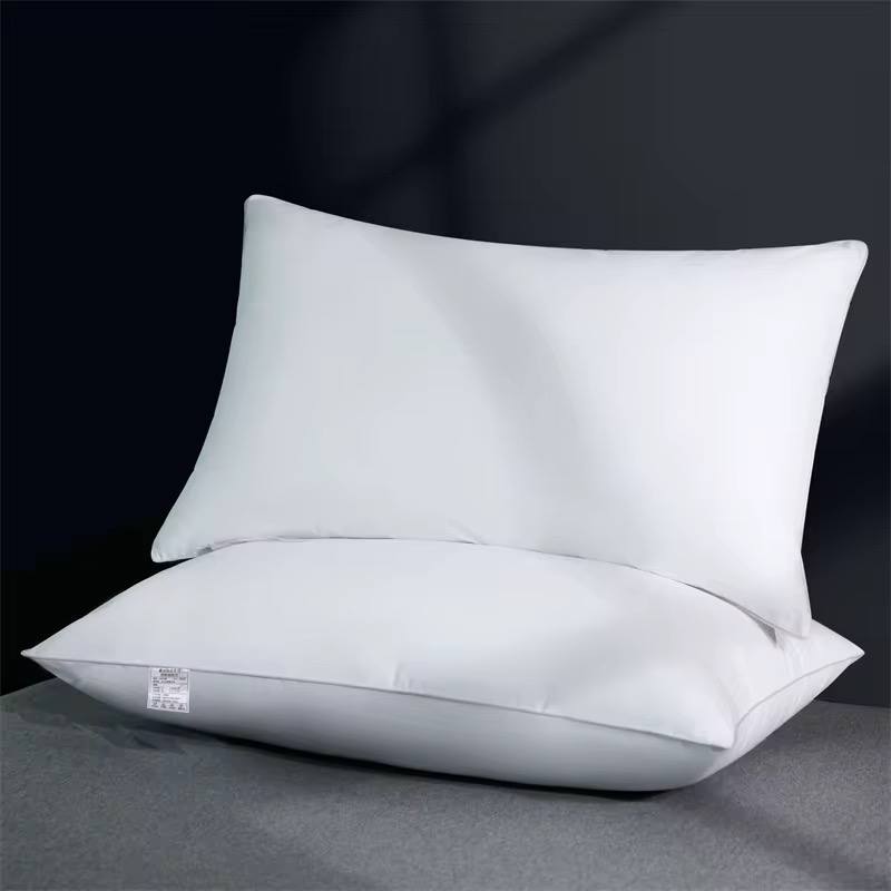 Compressed white comfy pillows.