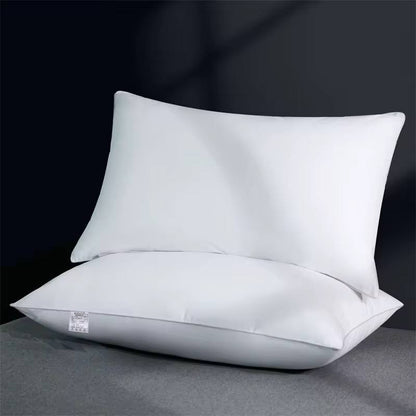 Compressed white comfy pillows.