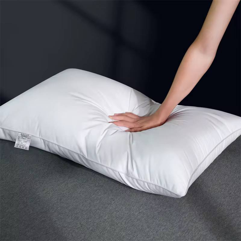 Compressed white comfy pillows.