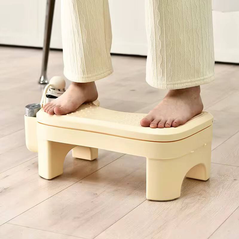 Ergonomic foldable / adjustable footrest with storage space