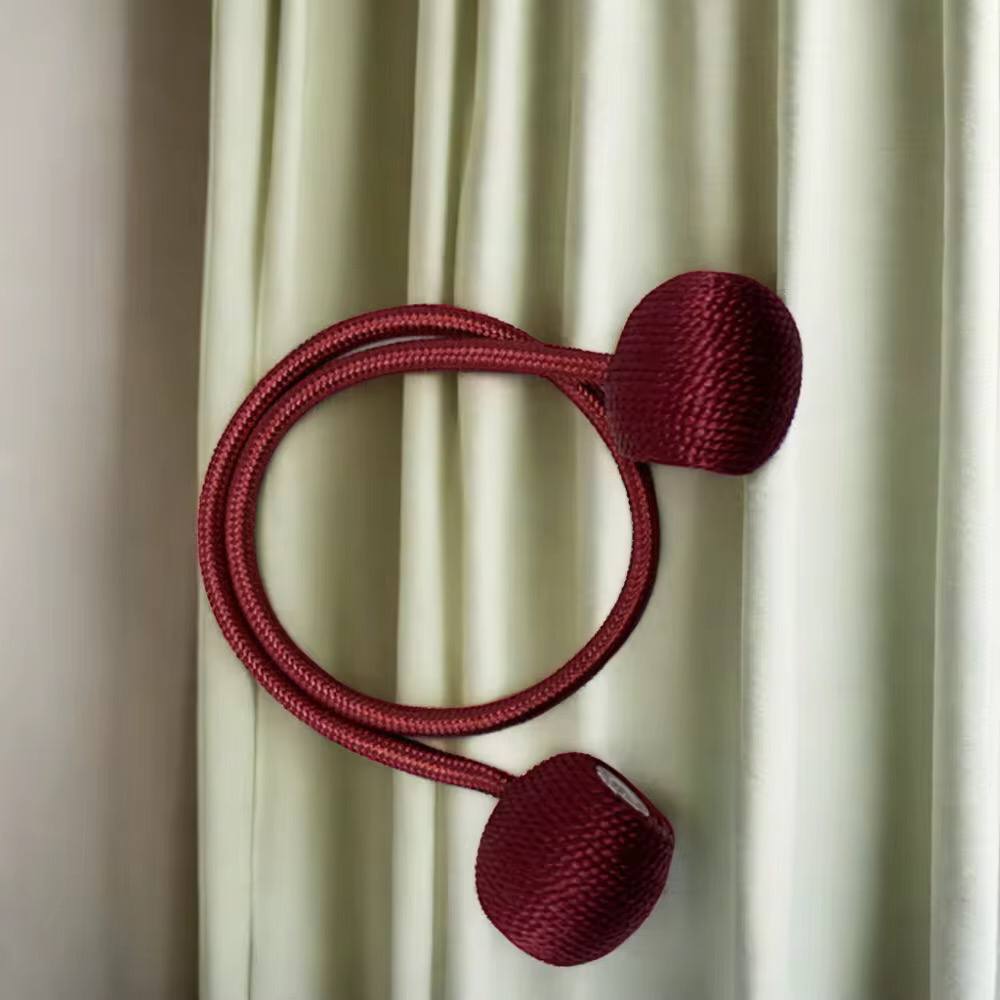 Magnetic curtain holders 
A pair