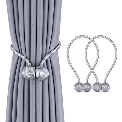 Magnetic tieback curtain holder