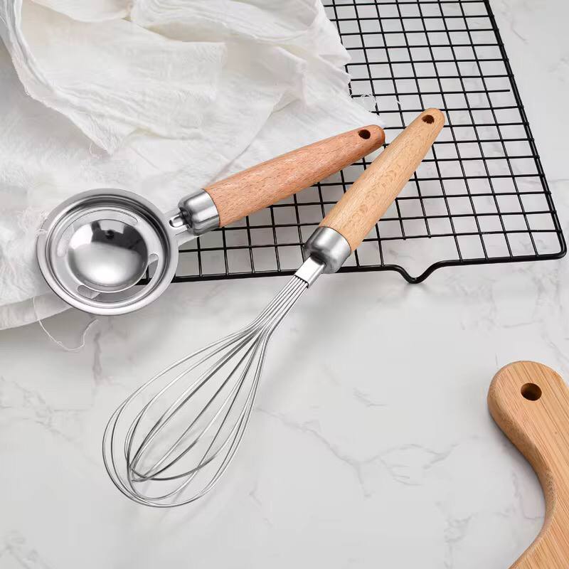 Stainless kitchen accessories with wooden handles