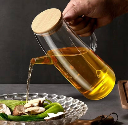 700ml Multipurpose curved oil Jar, perfect for oil, vinegar, soy sauce, etc. The curved glass oil dispenser can  be used in a bar, cafe shop, hotel, restaurant. The elegant appearance is a wonderful addition to your kitchen or your restaurant! The Curved